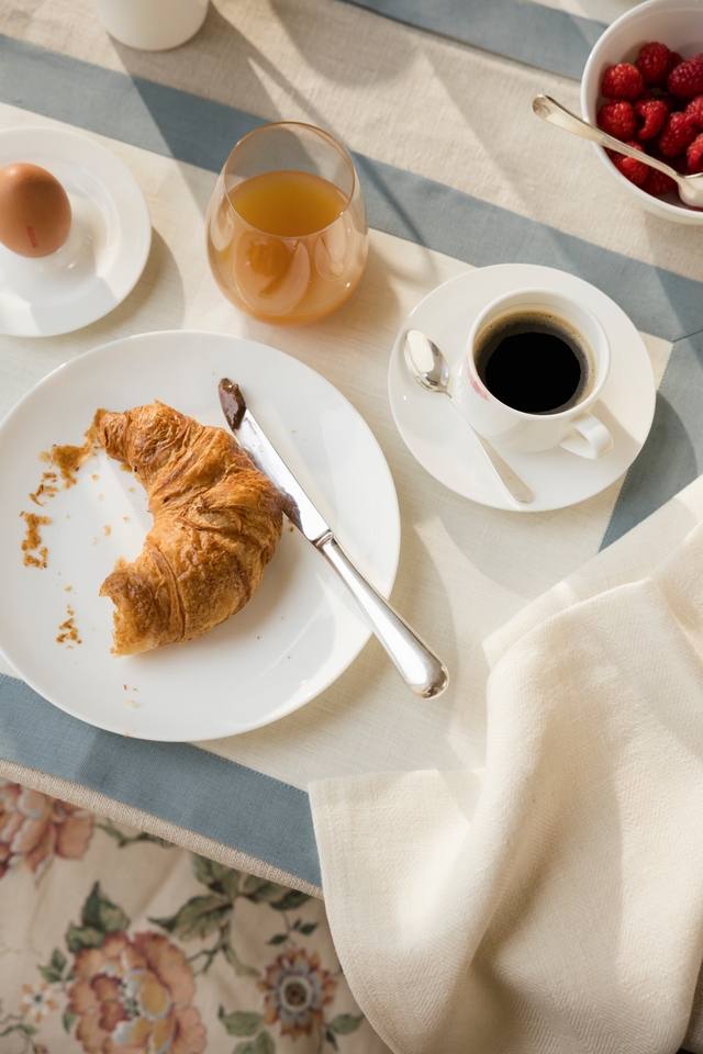 Linen placemats on a set table