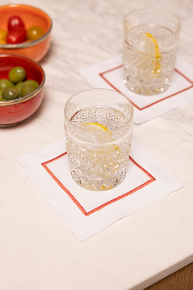 Cocktail napkins with drinks and hors d'oeuvres